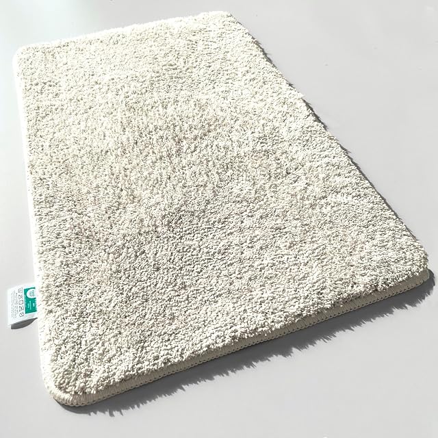 Alfombra de baño de microfibra de pelo alto color crema casa pura